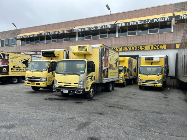 The Rising Threat to New York City’s Food System – State of the Planet Trucks getting loaded and ready to head out for final meat distribution.