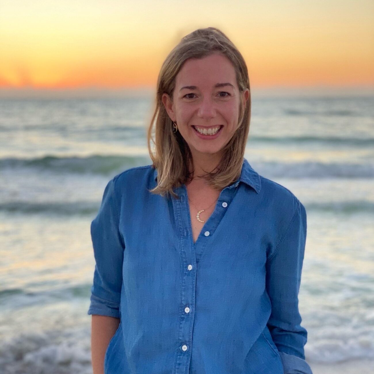Headshot of Alison Miller on a beach