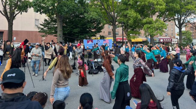 Tibetan association leads a traditional dance in Jackson Heights, Queens, NY