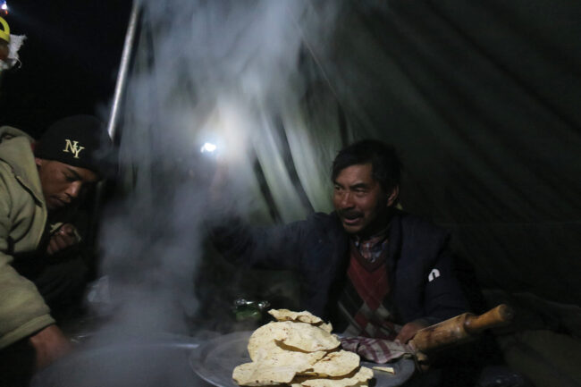 Guides cooking at camp