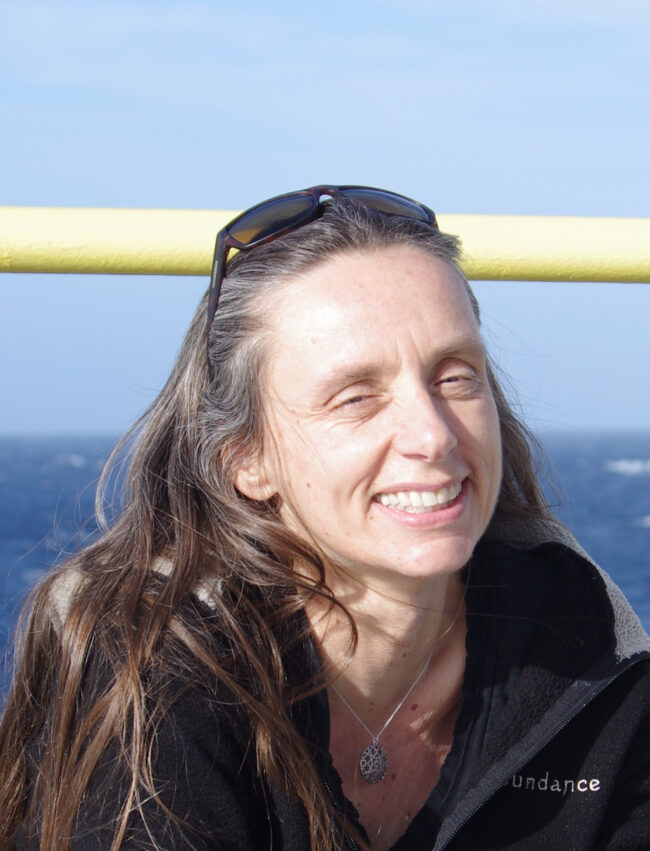 A photo of Gisela Winckler aboard a ship at sea