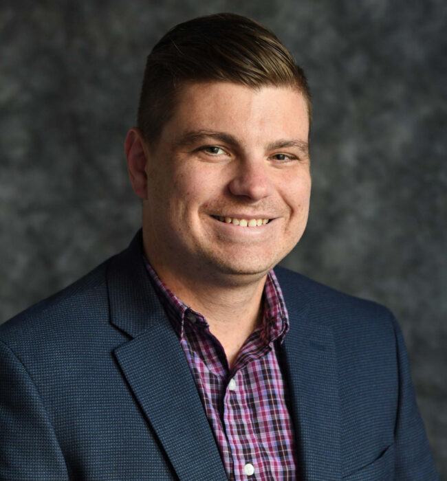 A headshot of Columbia University professor Daniel M. Westervelt.