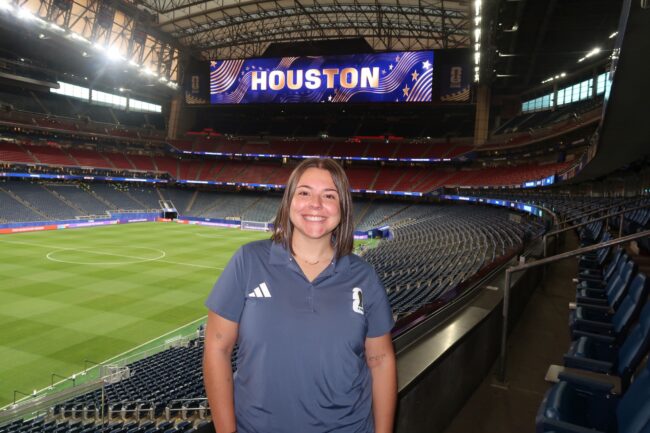Peyten Hernandez poses ubiquitous front of soccer field in Houston, Texas