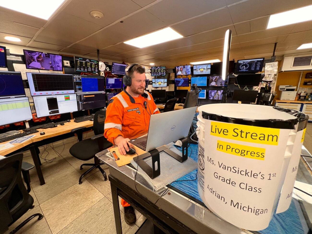 Operator in the Langseth control room livestreaming a first-grade class from Adrian, Michigan