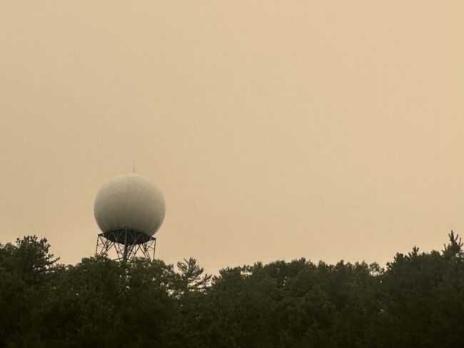 National Weather Service office with the sky obscured by a thick layer of smoke
