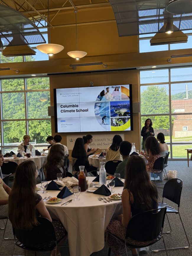Guests dine while speaker Alexis Abramson gives a Columbia Climate School presentation